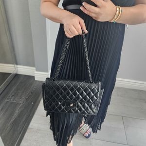 Used Chanel pattent leather black crossbody